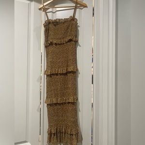 Floral fall color smocked midi dress with spaghetti straps. Worn once